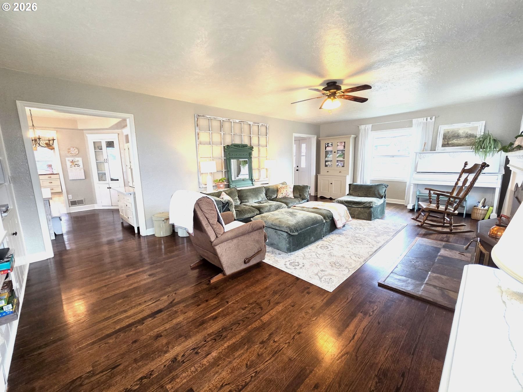 633 Southeast Hillcrest Road John Day, OR 97845 - Photo 30 of 48 a living room with furniture hard wood floor and a ceiling fan