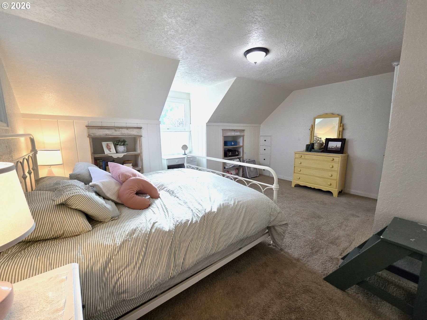 633 Southeast Hillcrest Road John Day, OR 97845 - Photo 37 of 48 a bed room with a bed and a night stand