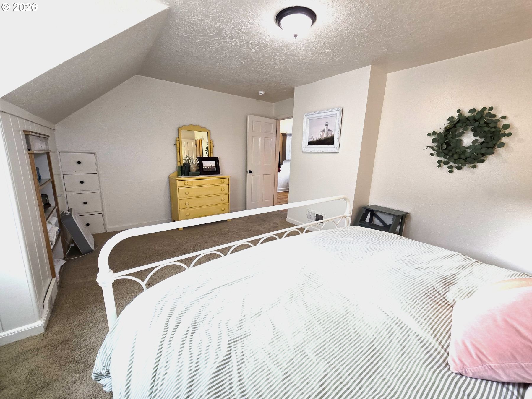 633 Southeast Hillcrest Road John Day, OR 97845 - Photo 38 of 48 a bedroom with a bed and a dresser