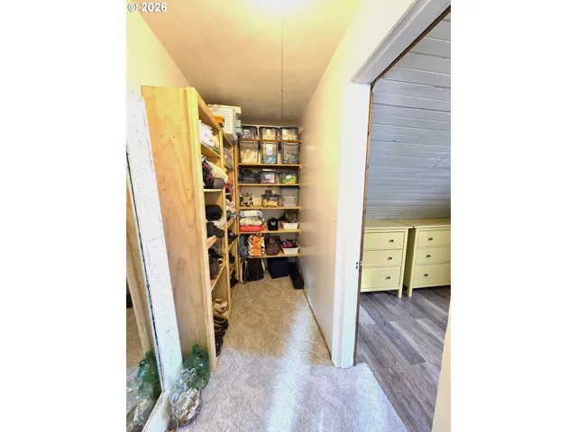 a view of a chairs and table in a room