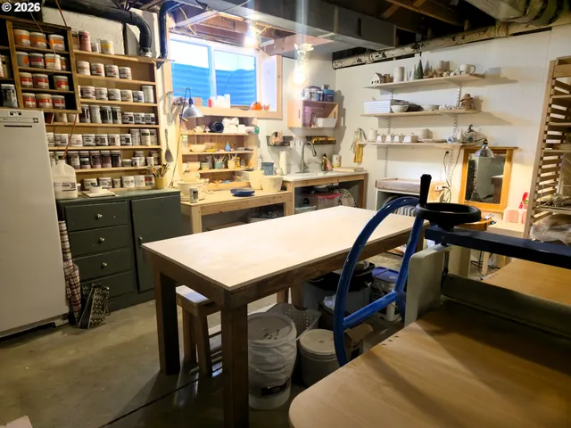 a living room with furniture and a chair