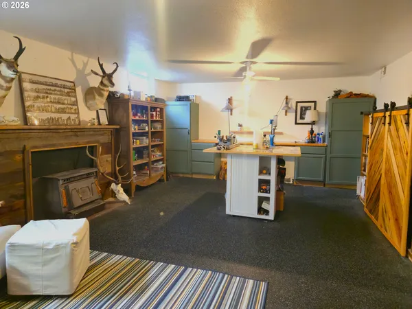 a view of a workspace with furniture