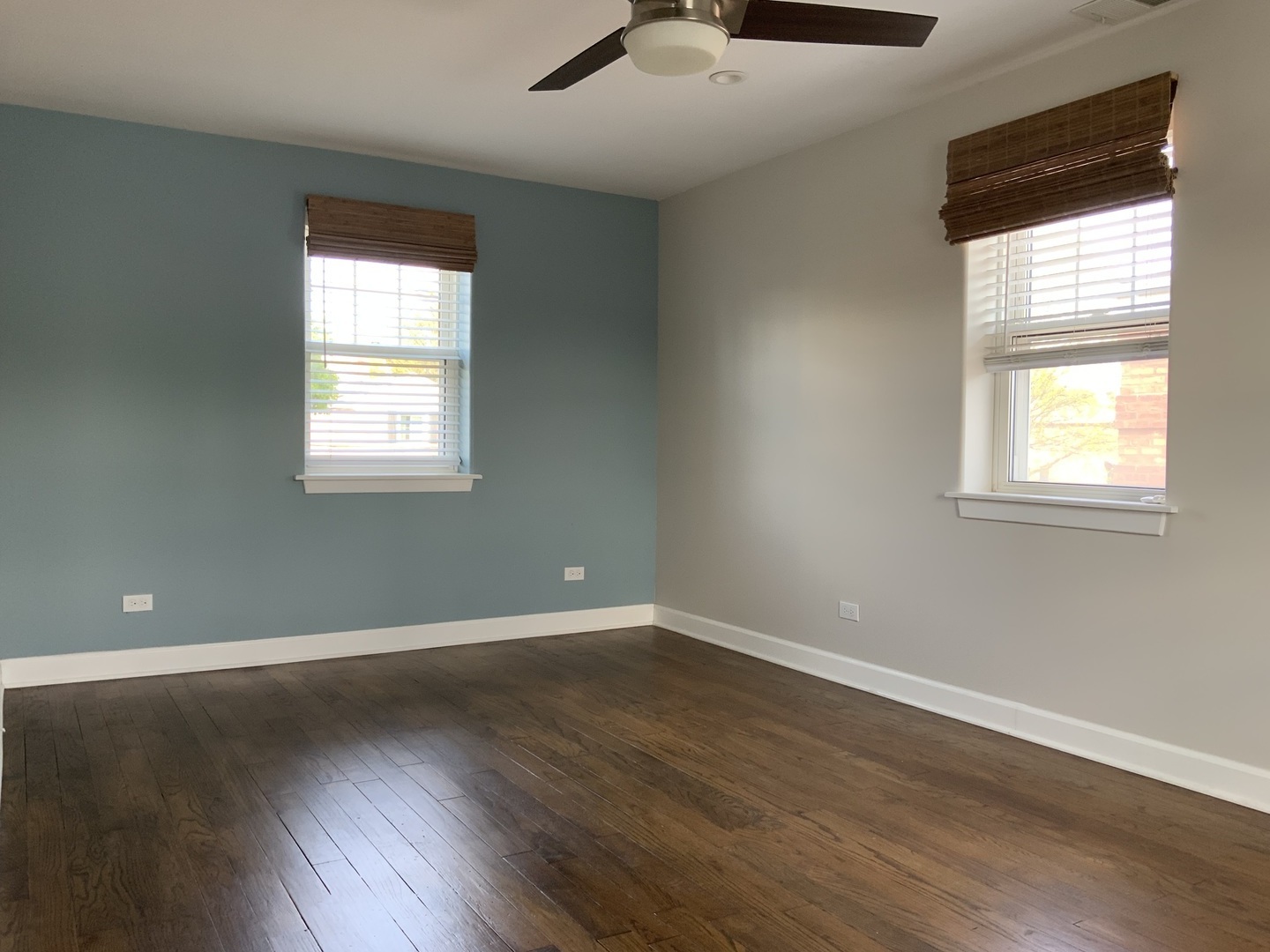 7835 West Berwyn Avenue Chicago, IL 60656 - Photo 13 of 17 an empty room with wooden floor and windows