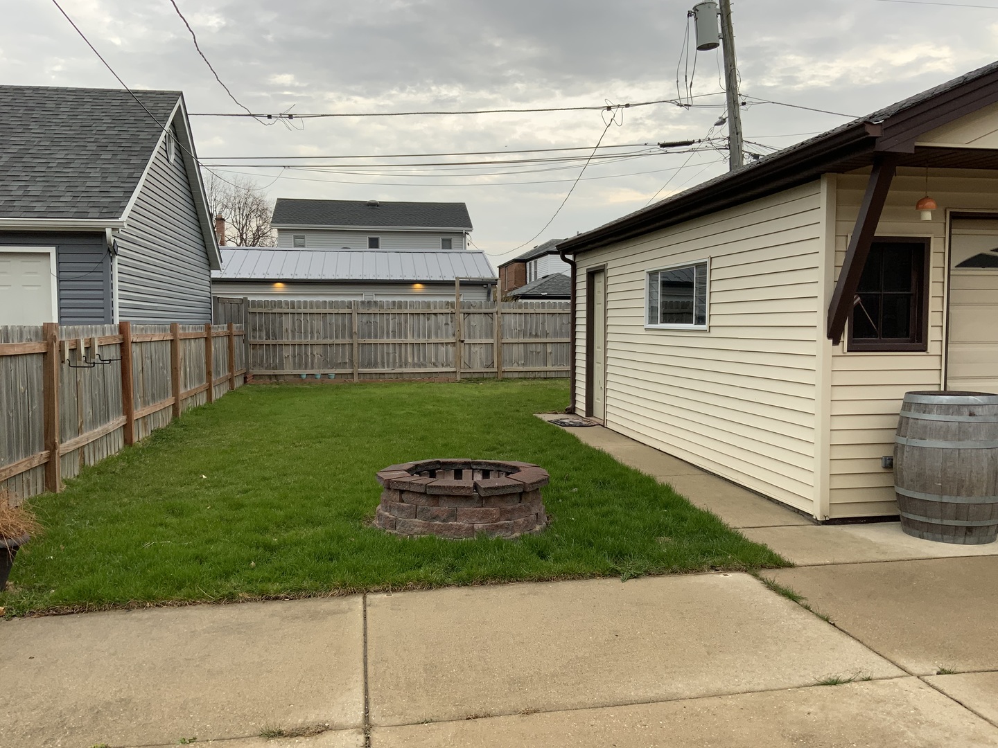 7835 West Berwyn Avenue Chicago, IL 60656 - Photo 17 of 17 a front view of a house with a yard