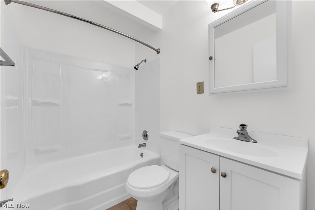 9716 Alexander Road Cleveland, OH 44125 - Photo 18 of 30 Full bathroom with vanity and washtub / shower combination