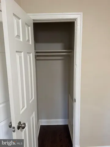 a kitchen with stainless steel appliances a refrigerator and a stove