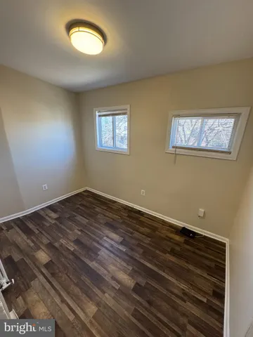 a view of a house with a snow in the yard