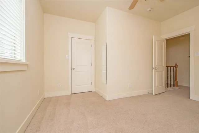 a view of a room with a en suite bathroom sink and a mirror
