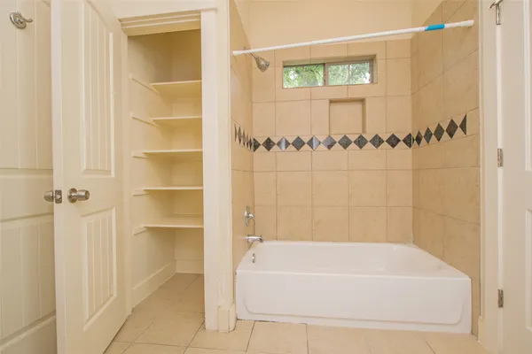 a bathroom with a bathtub