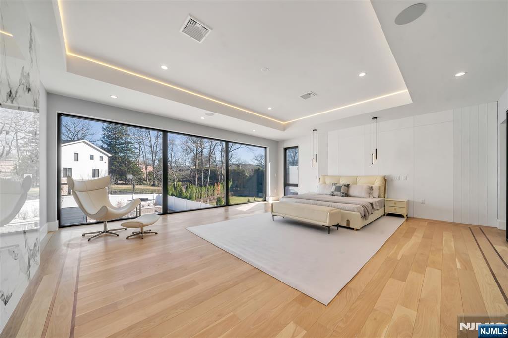 11 Roberts Road Englewood Cliffs, NJ 07632 - Photo 27 of 50 a living room with a large window and furniture