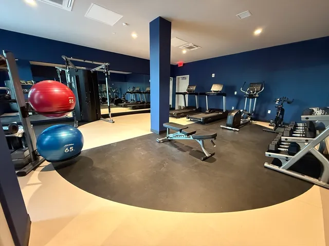 a view of a room with gym equipment