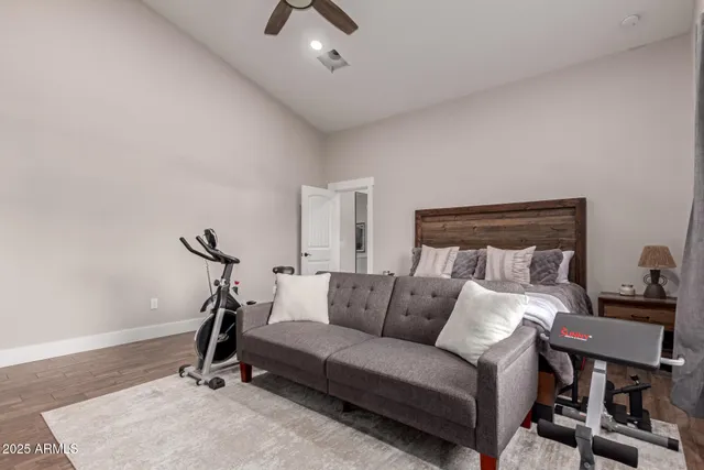 a bathroom with a sink toilet a mirror and shower