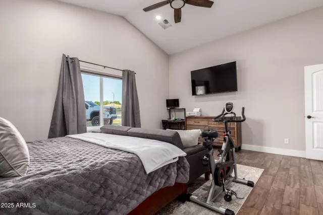 a bathroom with a double vanity sink a mirror and a shower