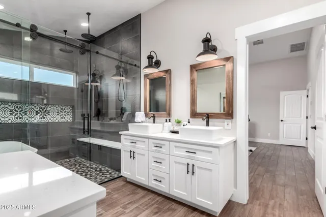 a bedroom with a bed and a television