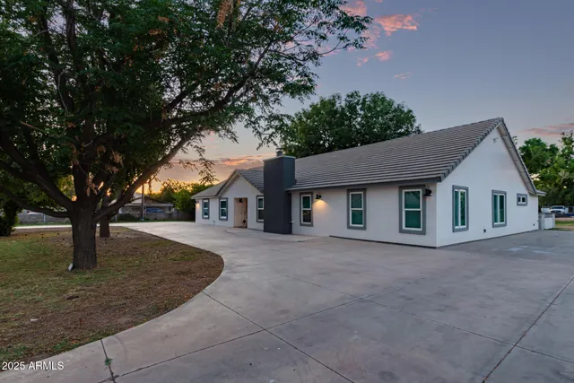 front view of a house with a yard
