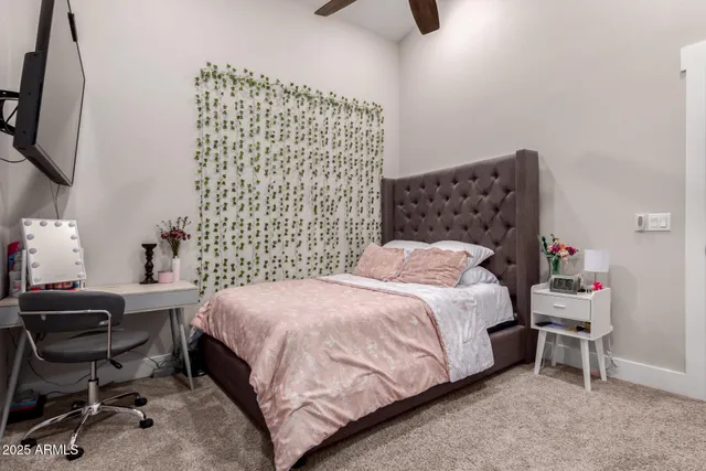 a bathroom with a double vanity sink mirror and shower