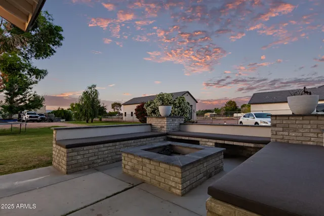a front view of house with outdoor space and garden