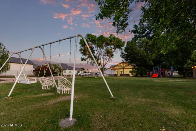 a view of swimming pool with outdoor seating