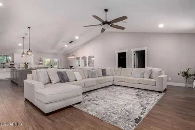 a living room with furniture and a view of living room