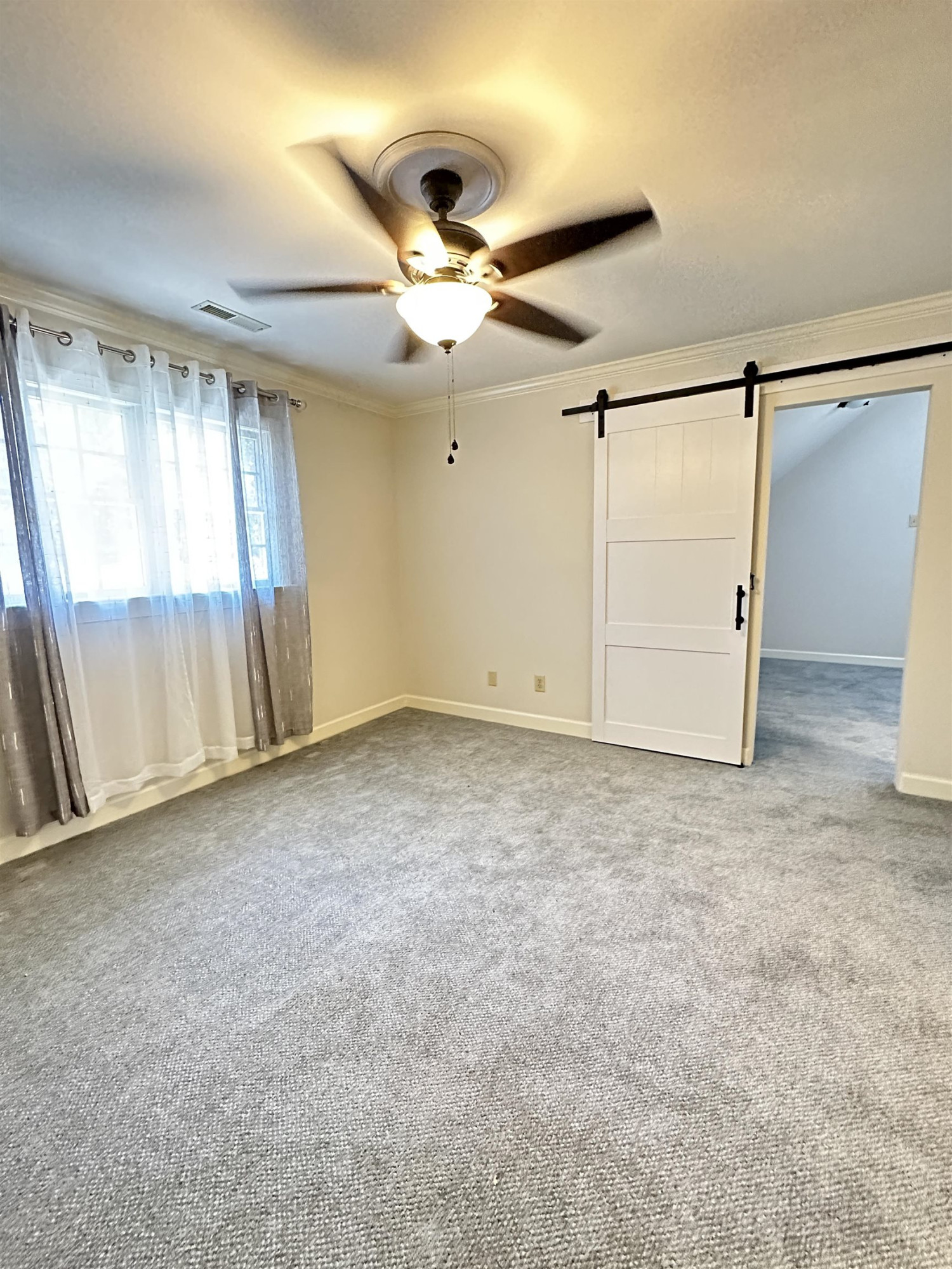 100 Grey Bridge Row Cary, NC 27513 - Photo 17 of 28 a view of an empty room with a window