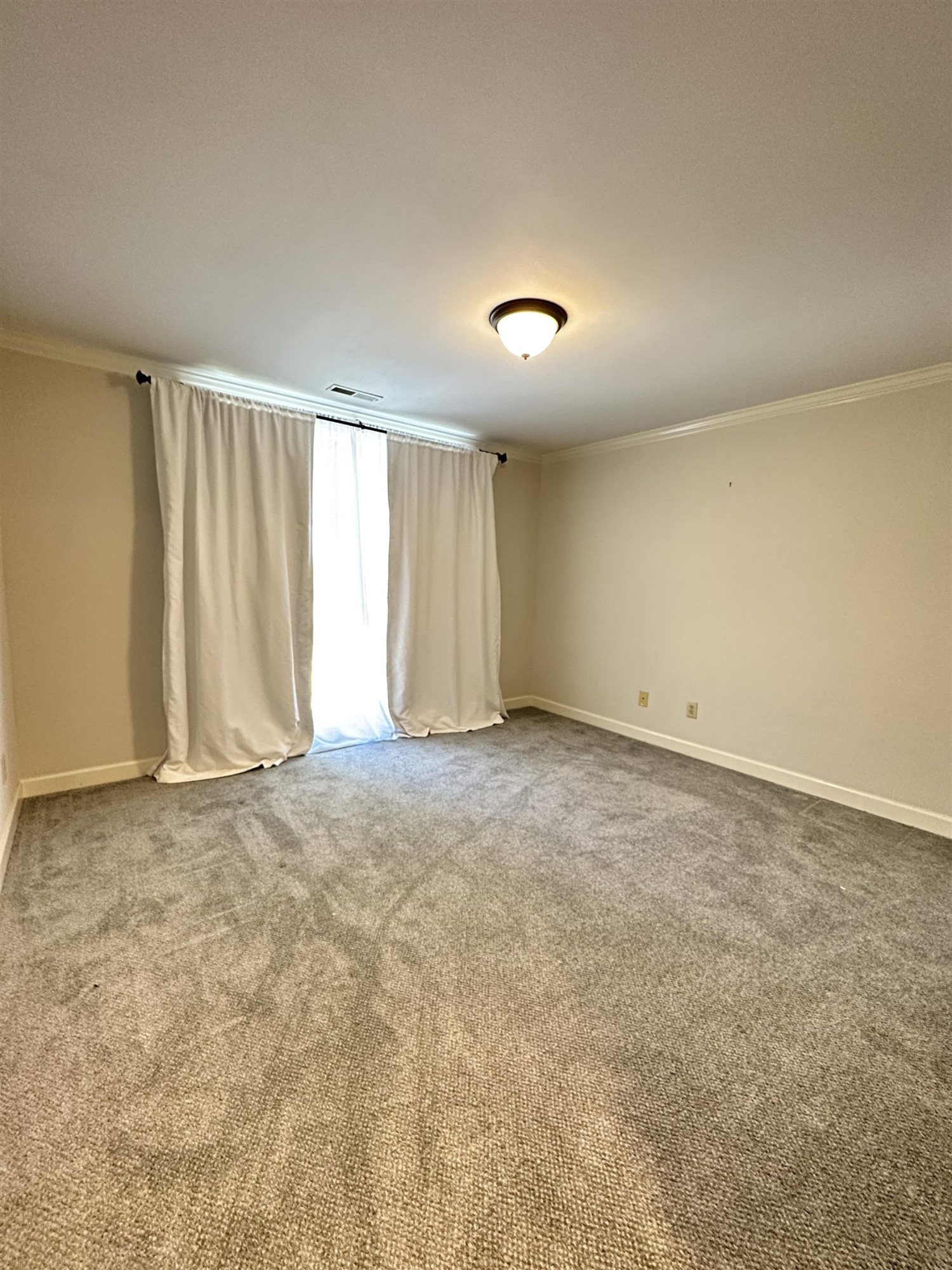 100 Grey Bridge Row Cary, NC 27513 - Photo 20 of 28 an empty room with a empty space and a window