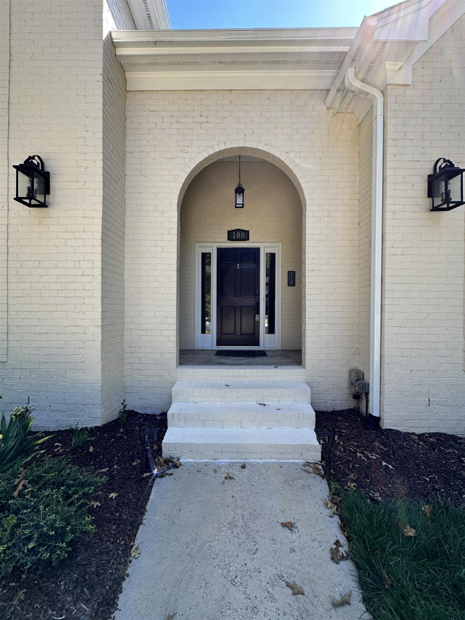 100 Grey Bridge Row Cary, NC 27513 - Photo 2 of 28 a front view of a house with garden