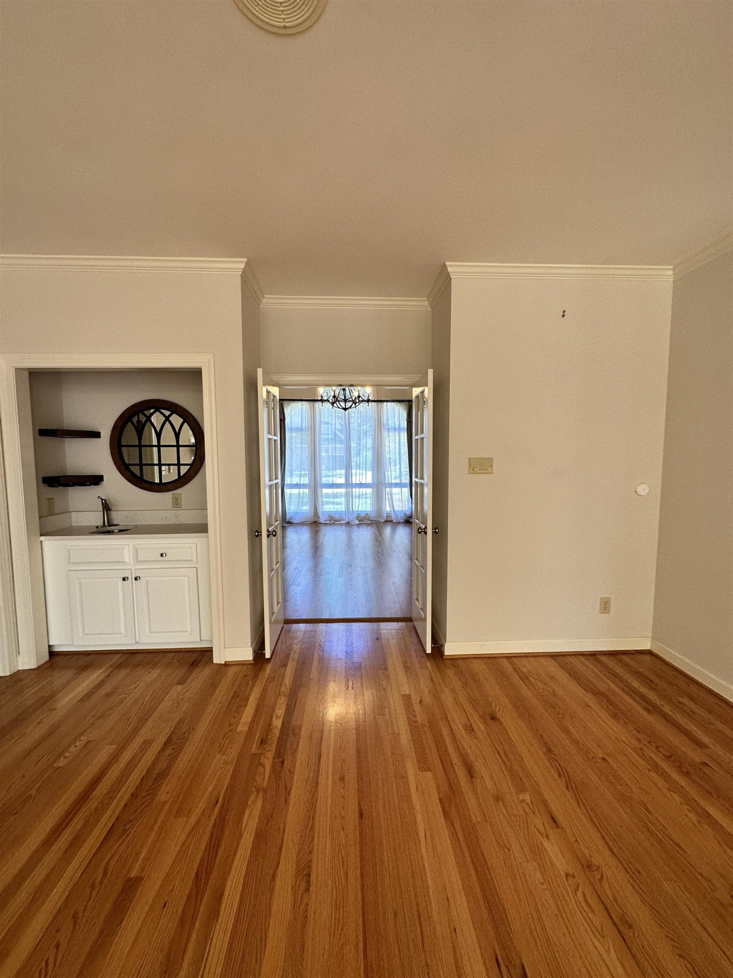 100 Grey Bridge Row Cary, NC 27513 - Photo 9 of 28 a view of a livingroom with wooden floor