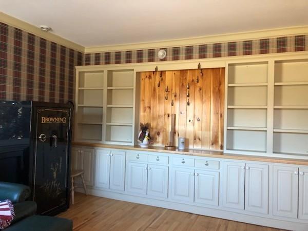 34 West Main Road, Unit L Peru, MA 01235 - Photo 22 of 26 a view of wooden floor and cabinet in a room