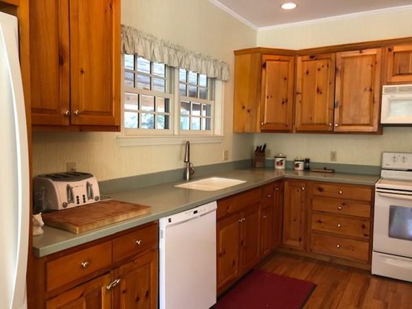 34 West Main Road, Unit L Peru, MA 01235 - Photo 8 of 26 a kitchen with a cabinets window and a sink