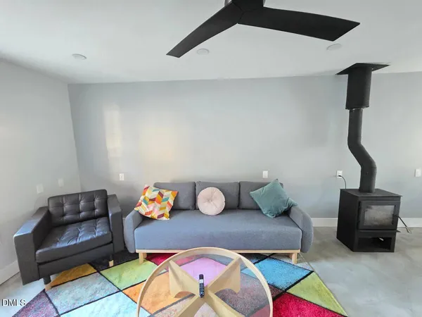 a living room with furniture and a couch
