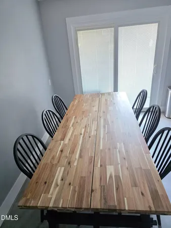 a view of wooden floor in a bedroom