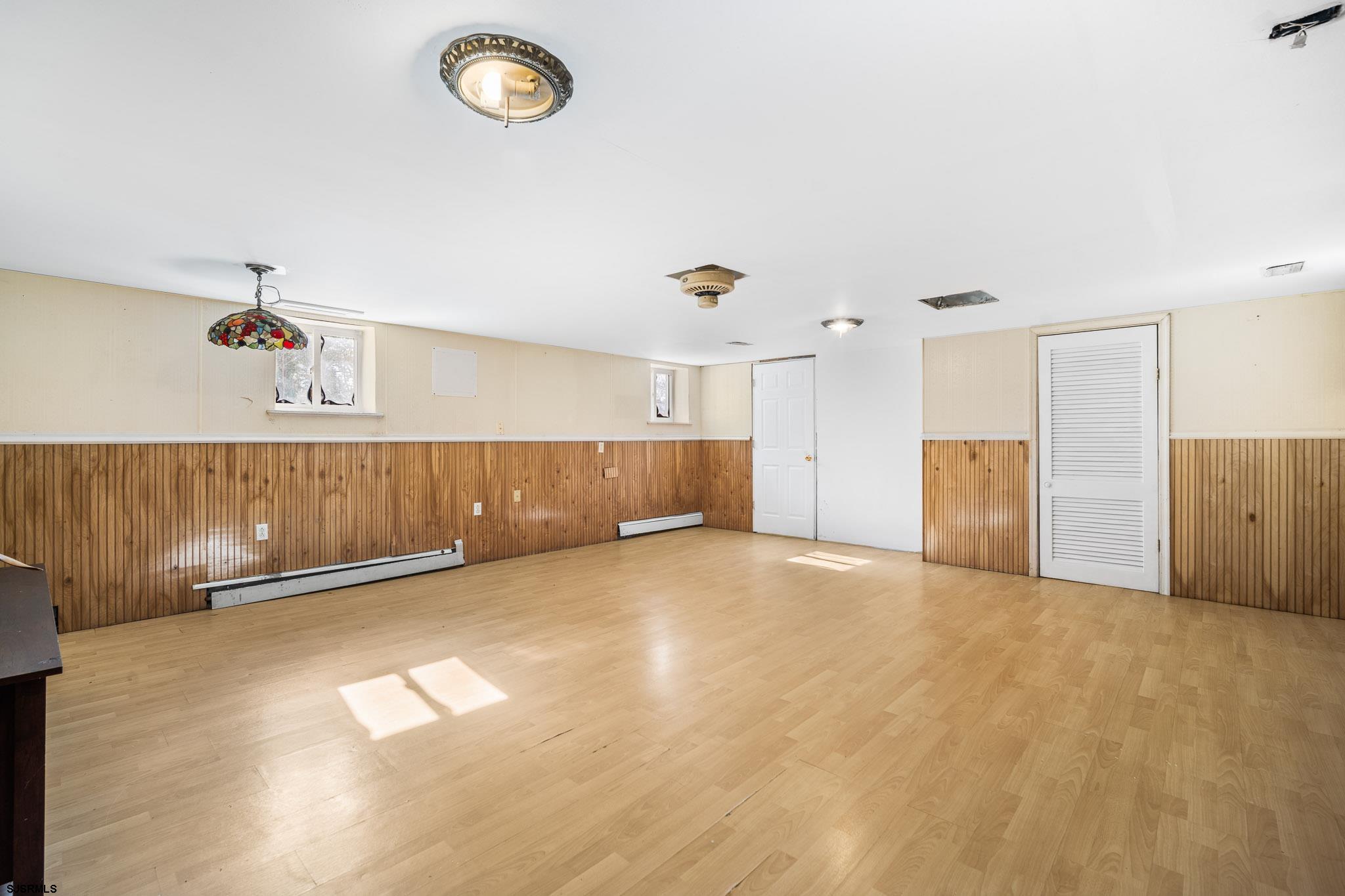 123 Bayview Drive Absecon, NJ 08201 - Photo 12 of 23 a view of a kitchen with a dishwasher and a cabinets