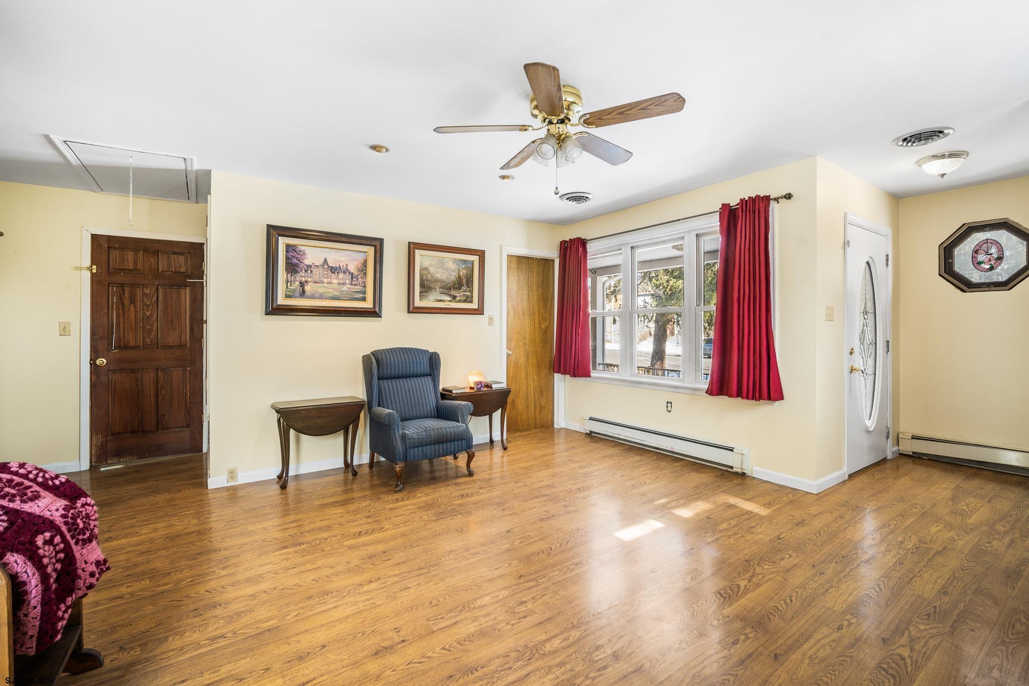 123 Bayview Drive Absecon, NJ 08201 - Photo 15 of 23 a living room with furniture and a window