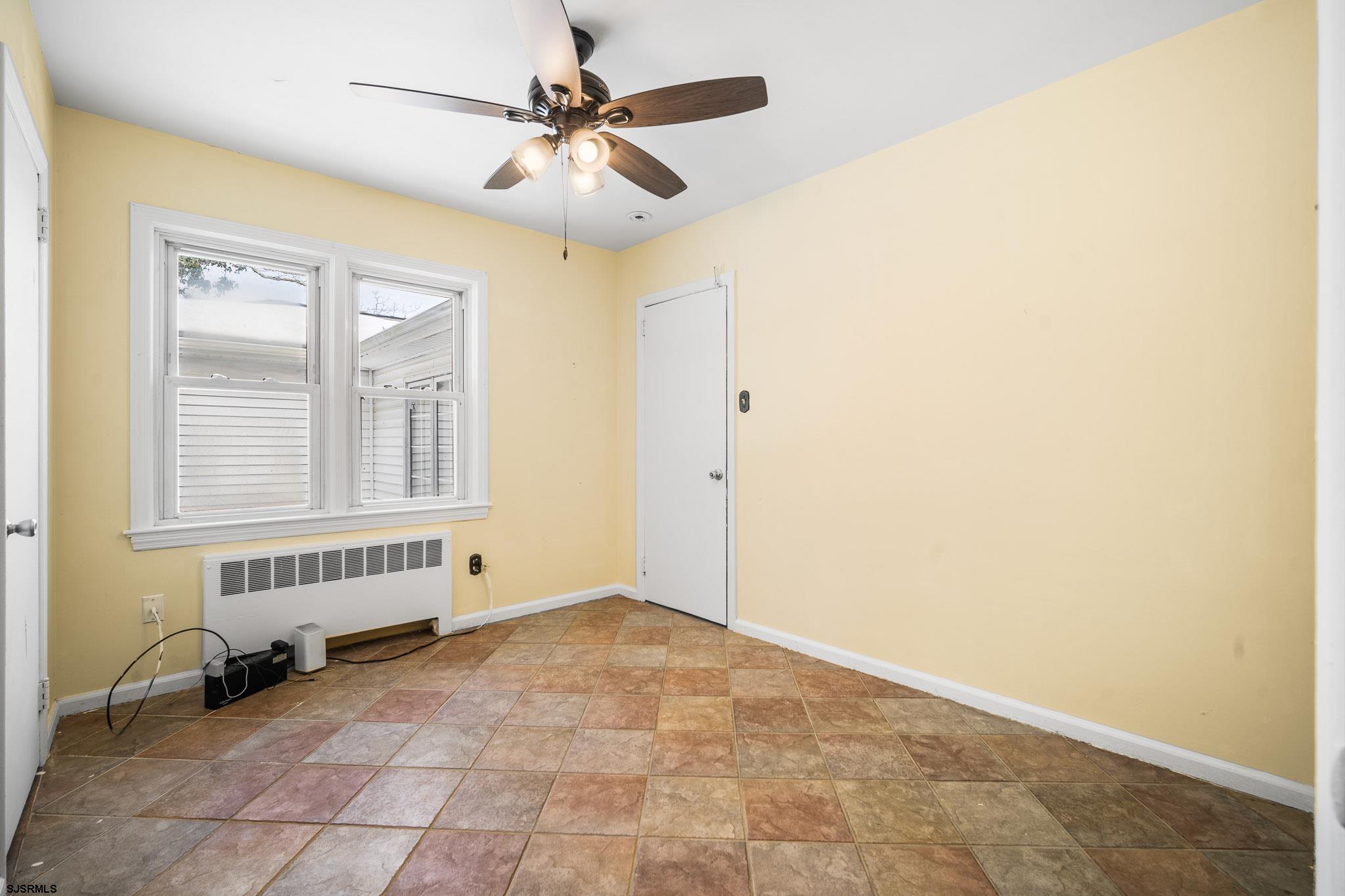 123 Bayview Drive Absecon, NJ 08201 - Photo 20 of 23 a view of an empty room with a window