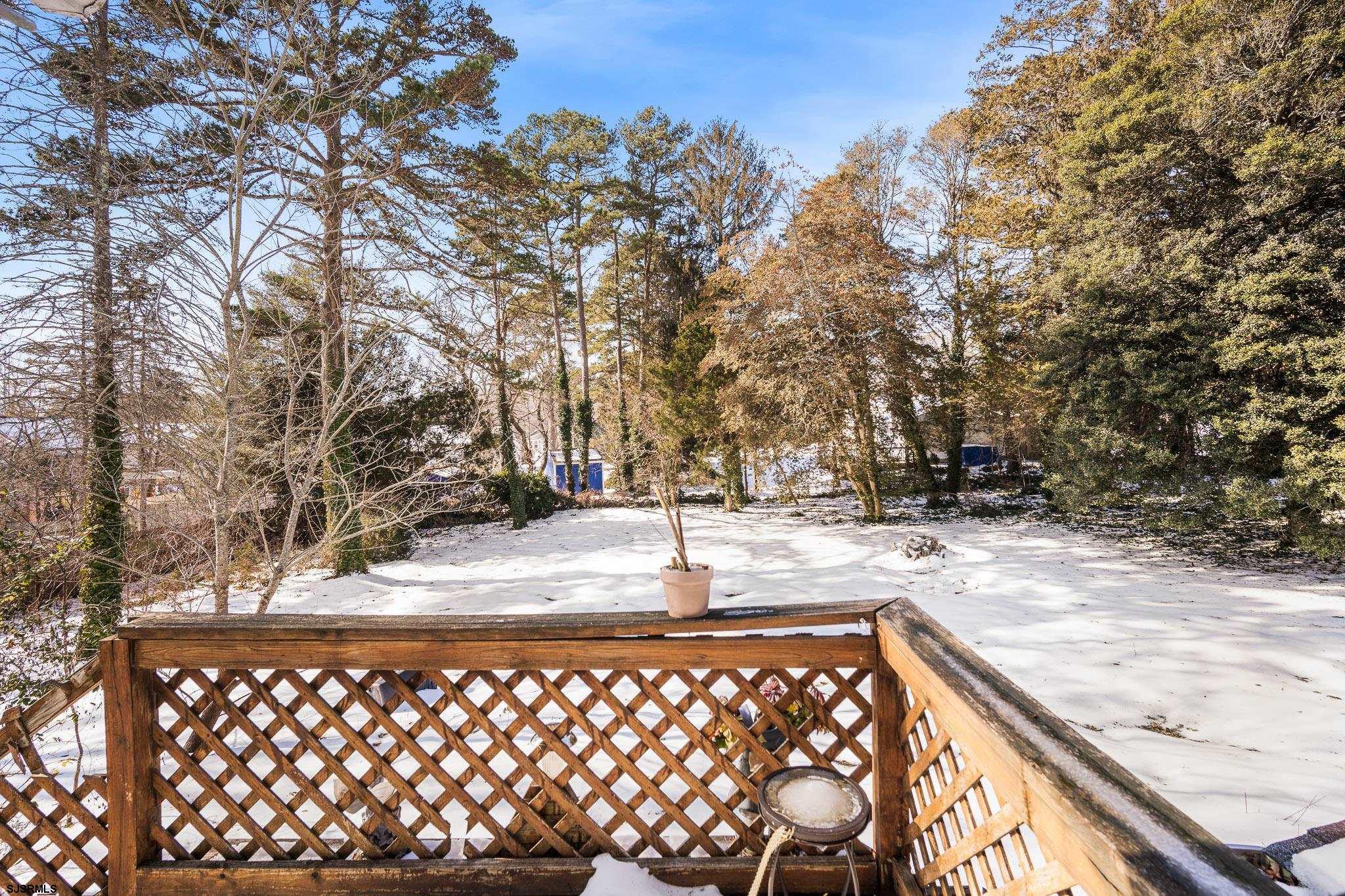 123 Bayview Drive Absecon, NJ 08201 - Photo 5 of 23 a backyard of a house