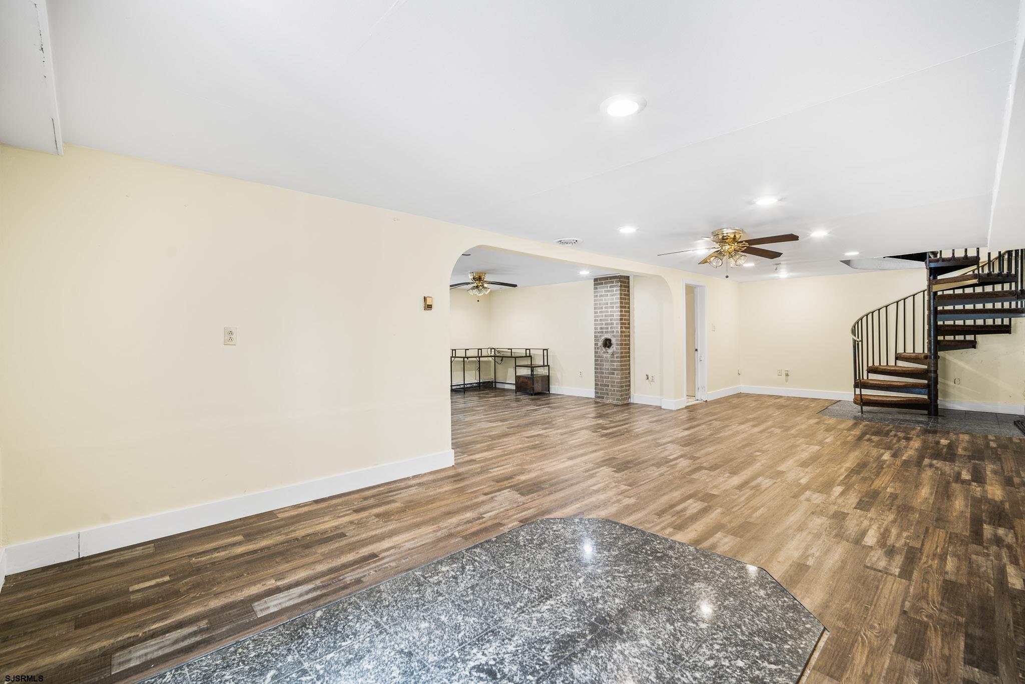 123 Bayview Drive Absecon, NJ 08201 - Photo 9 of 23 a view of a kitchen with a sink and a refrigerator