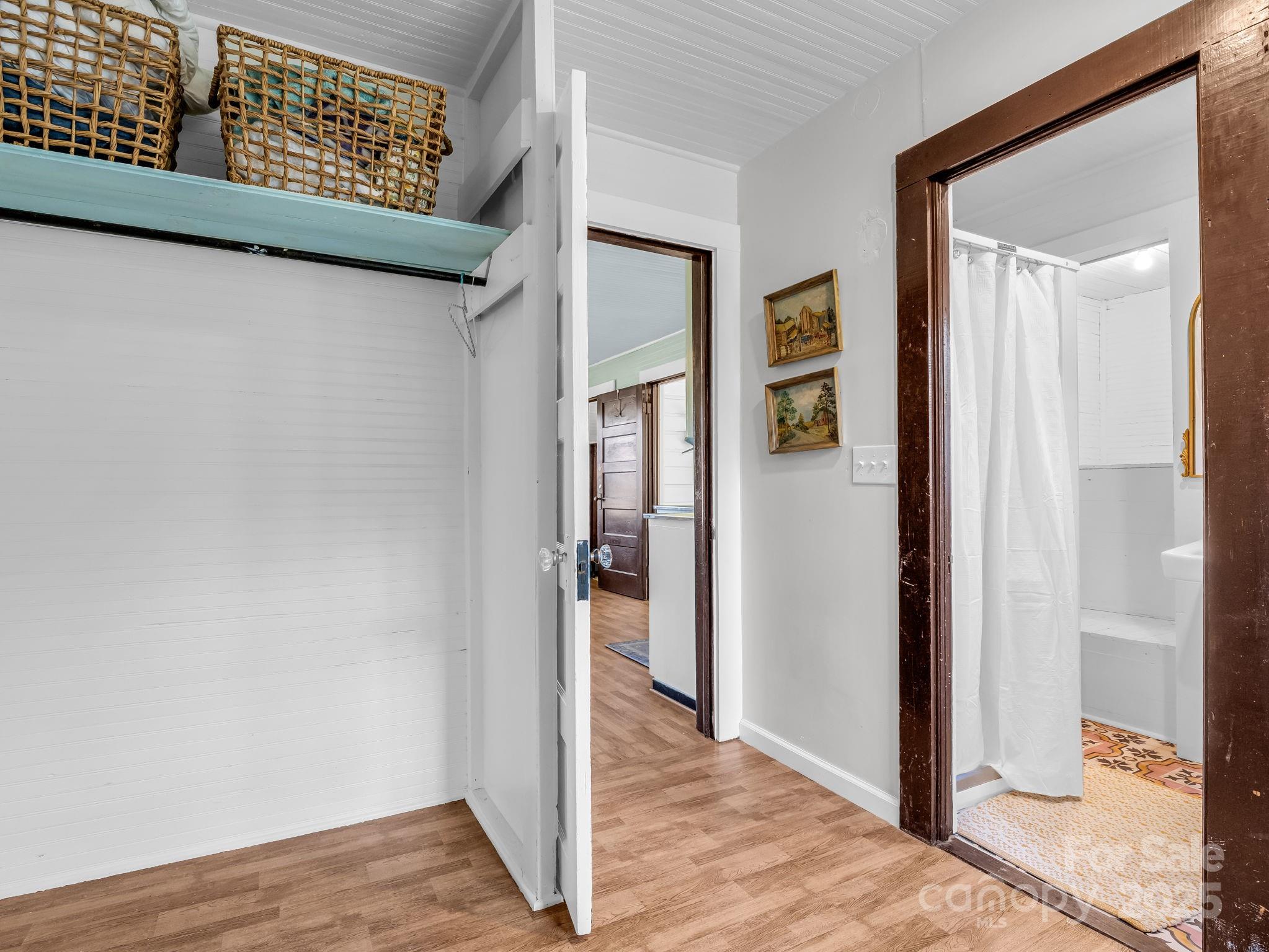1600 Orchard Road Flat Rock, NC 28731 - Photo 12 of 33 a view of a hallway with wooden floor and entryway