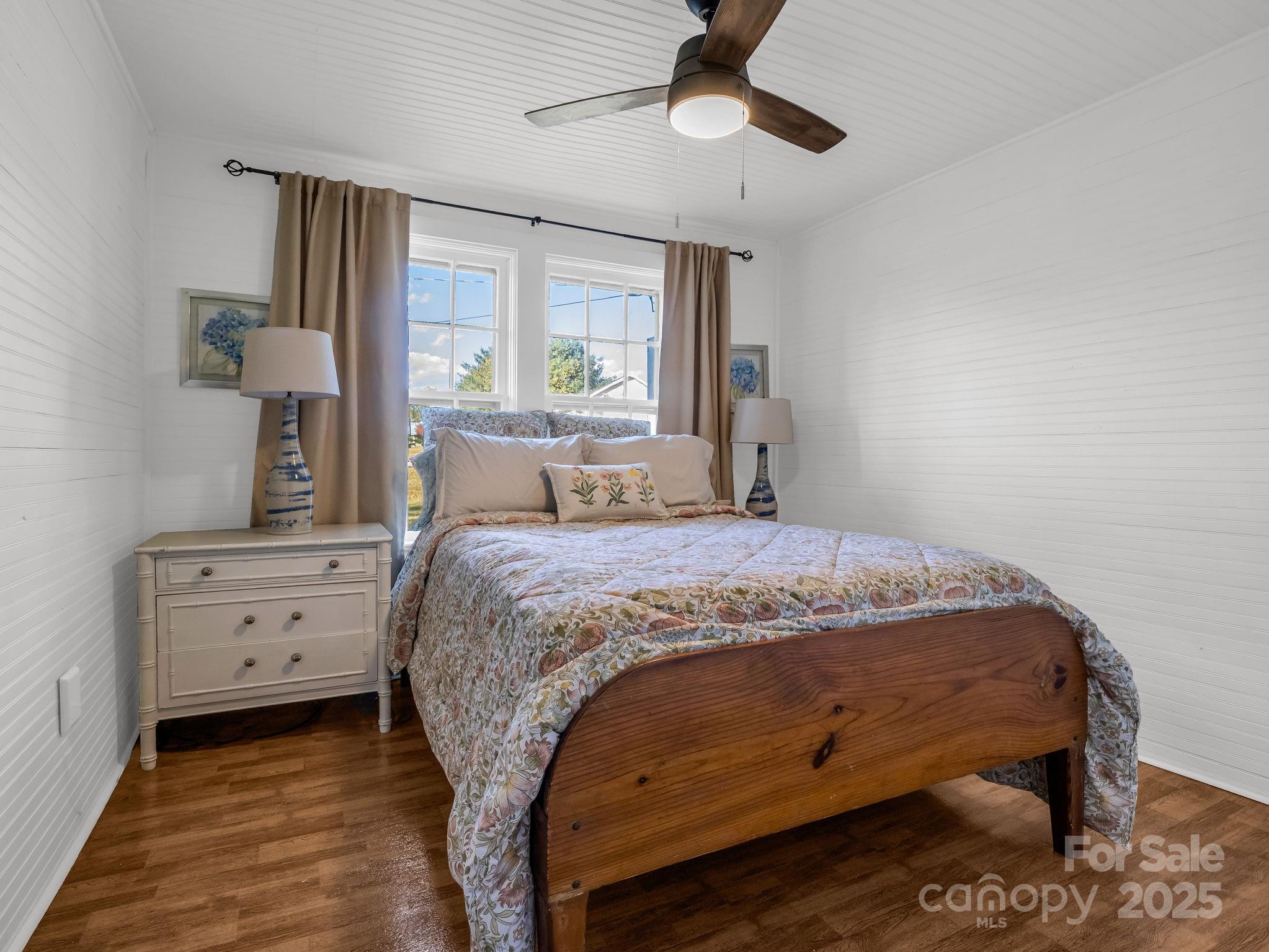 1600 Orchard Road Flat Rock, NC 28731 - Photo 16 of 33 a bedroom with a bed and a window