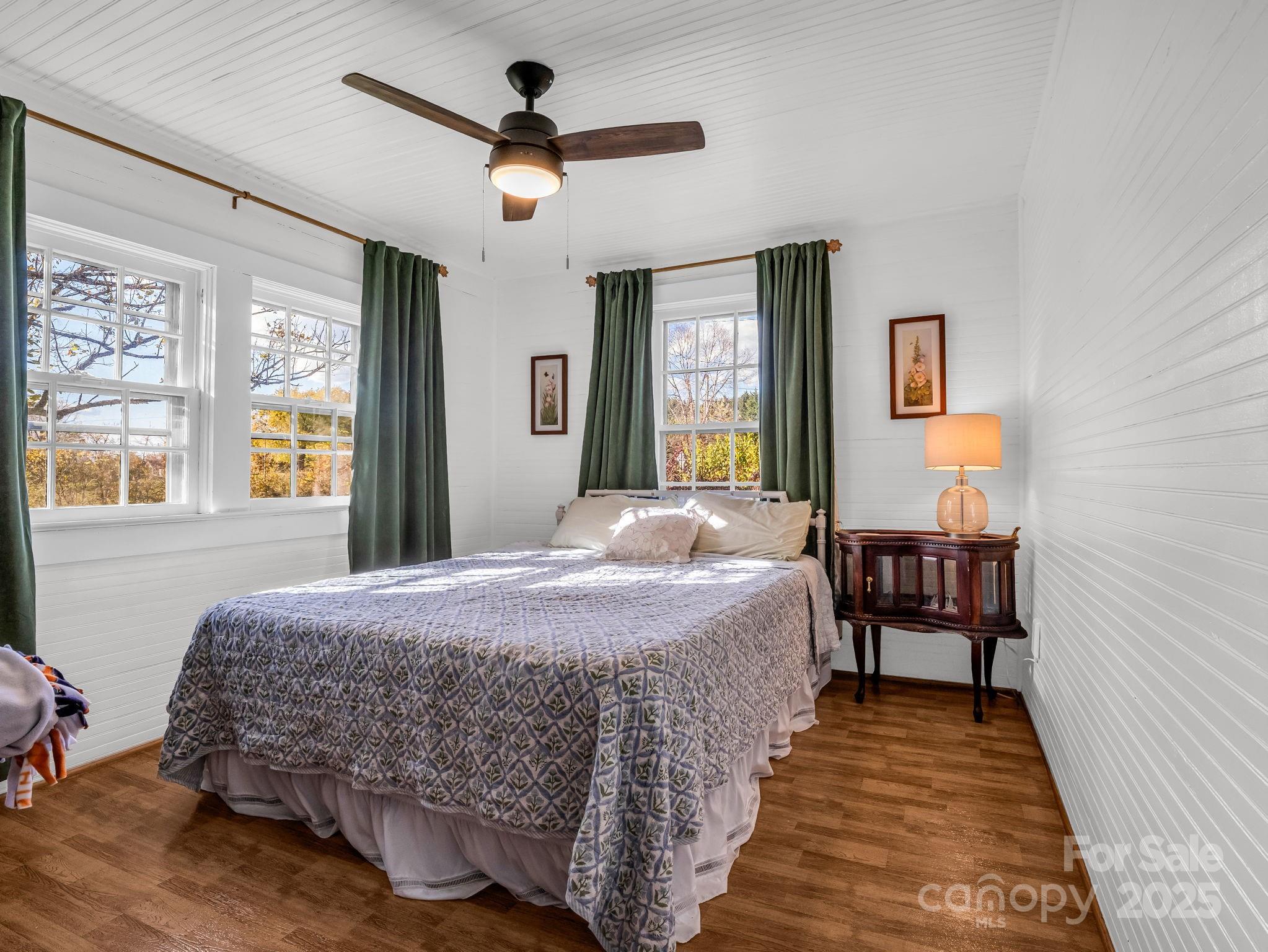 1600 Orchard Road Flat Rock, NC 28731 - Photo 17 of 33 a bed room with a bed and a window