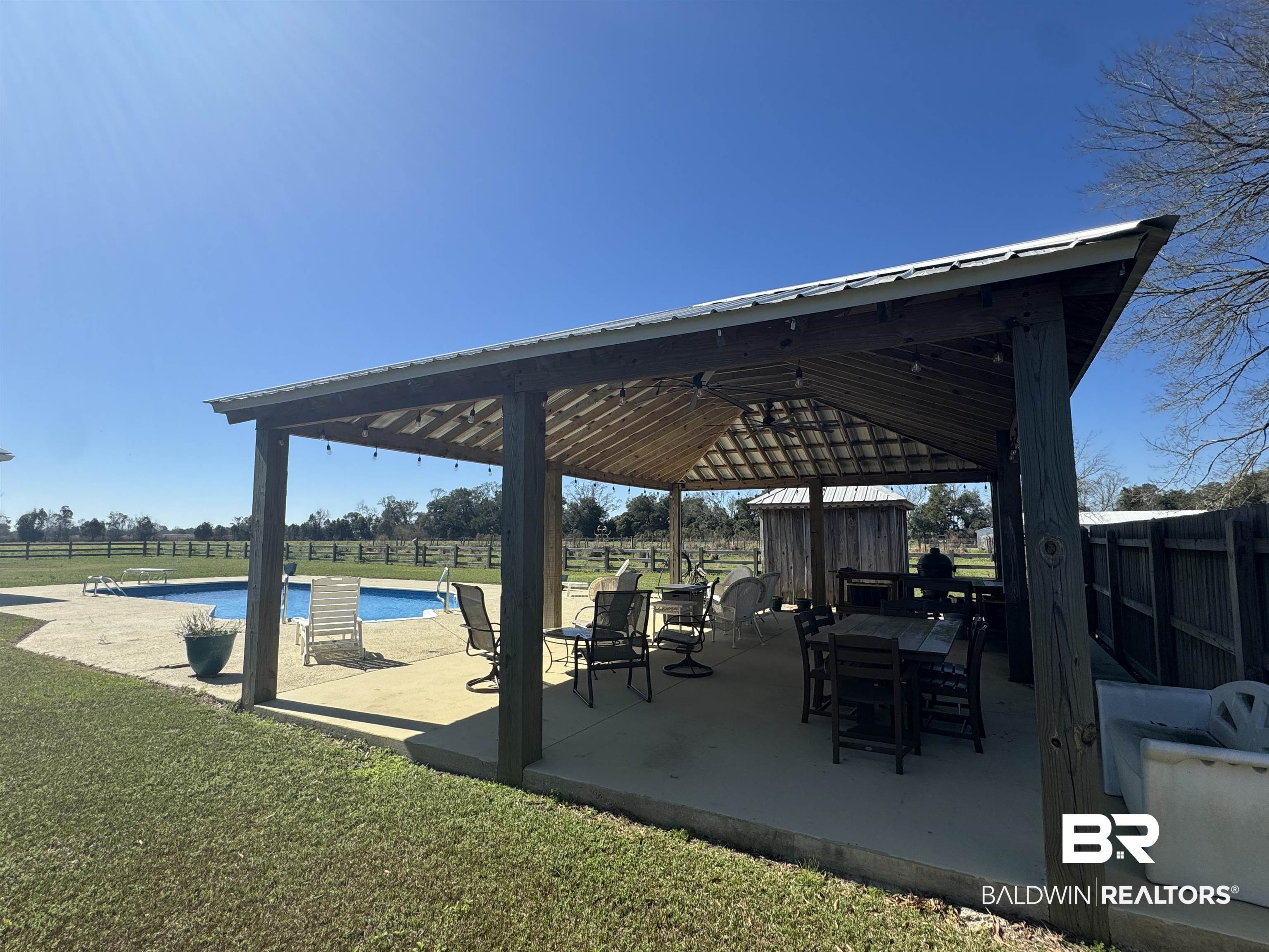 15165 Daugherty Road Foley, AL 36535 - Photo 45 of 70 View of patio with a gazebo and a fenced in pool