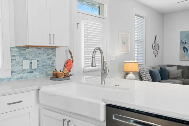 a kitchen with a stove and cabinets