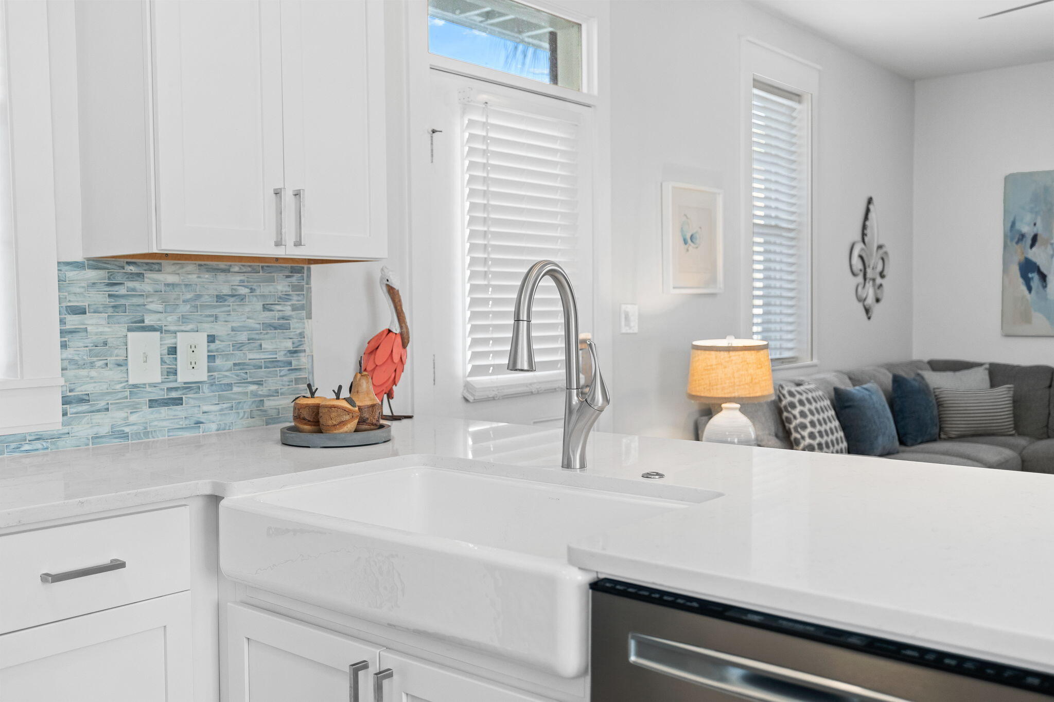 198 Somerset Bridge Road, Unit 137 Santa Rosa Beach, FL 32459 - Photo 11 of 46 a kitchen with a sink and a stove with white cabinets