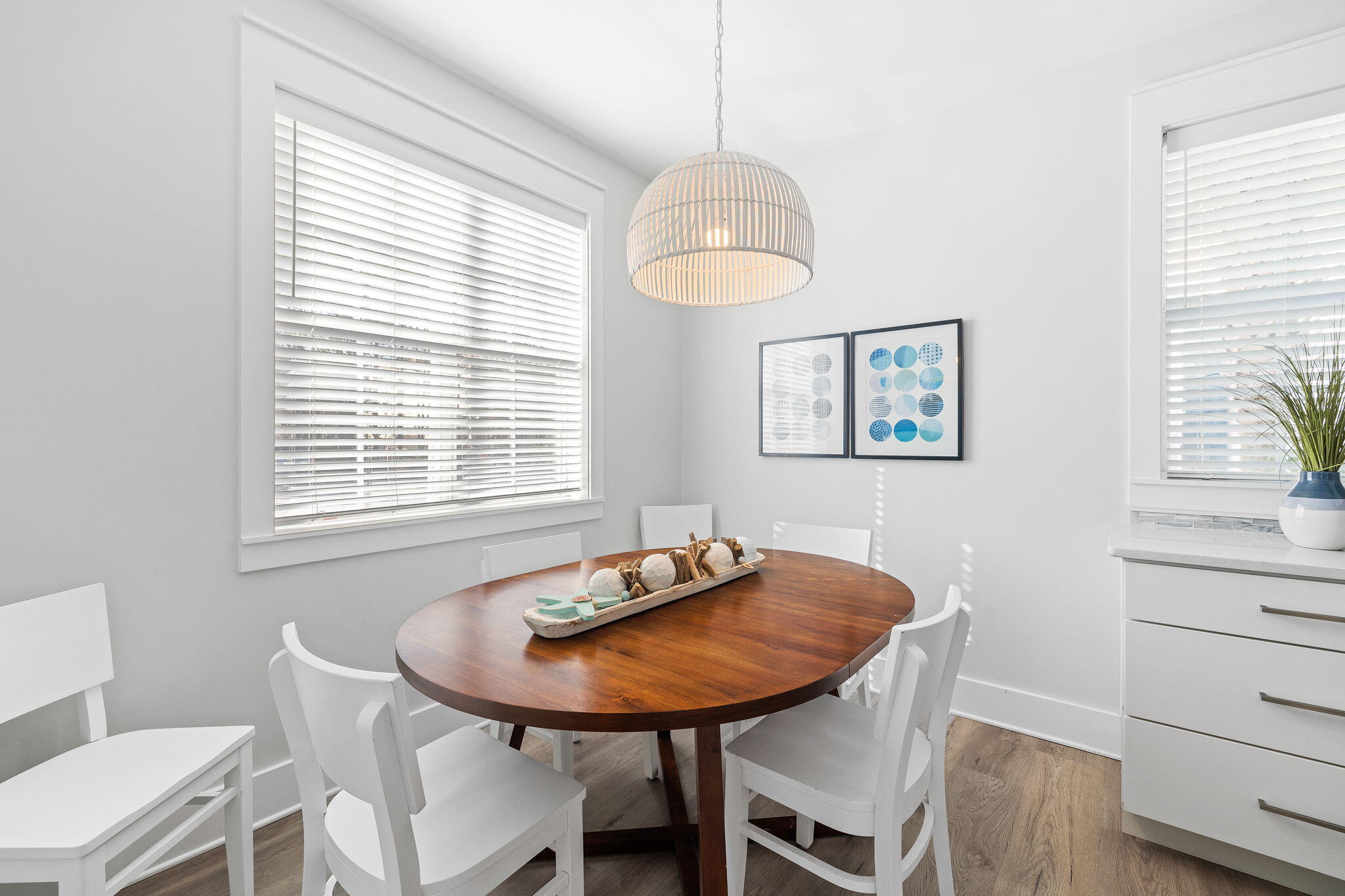 198 Somerset Bridge Road, Unit 137 Santa Rosa Beach, FL 32459 - Photo 14 of 46 a view of a dining room with furniture and wooden floor