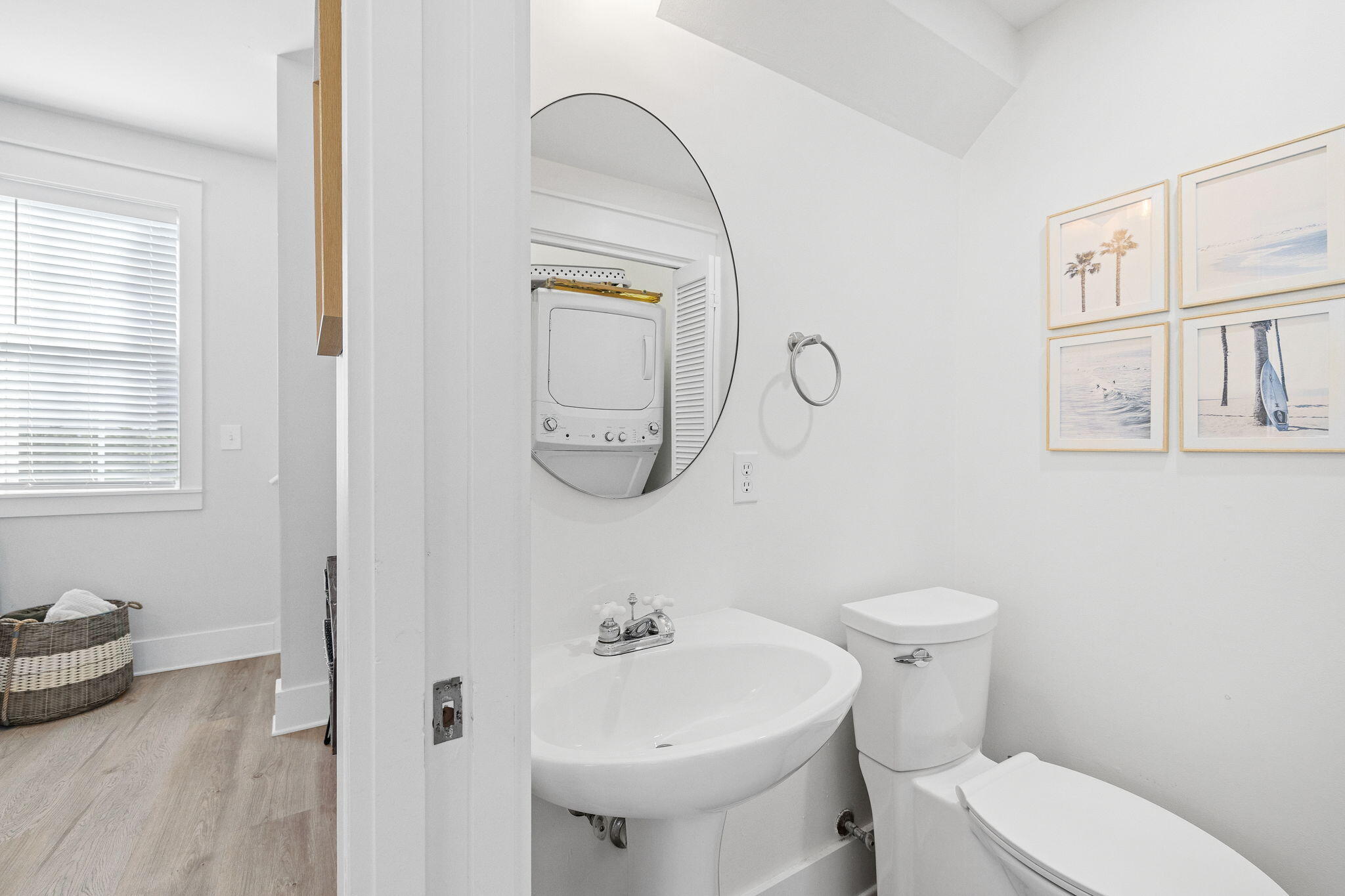 198 Somerset Bridge Road, Unit 137 Santa Rosa Beach, FL 32459 - Photo 18 of 46 a bathroom with a sink a toilet and a mirror