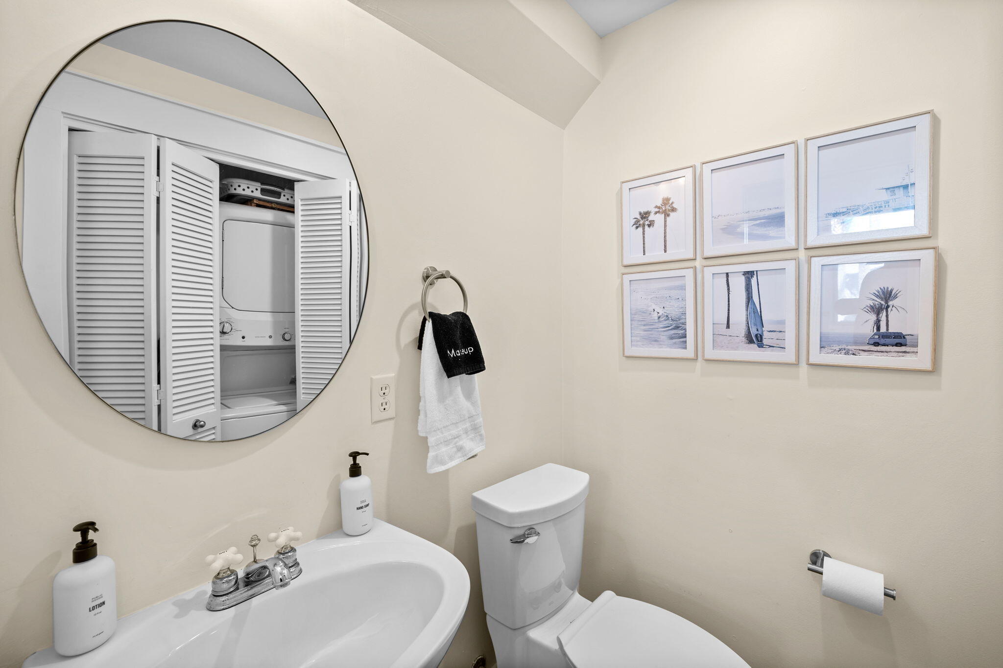 198 Somerset Bridge Road, Unit 137 Santa Rosa Beach, FL 32459 - Photo 26 of 46 a bathroom with a sink mirror and toilet