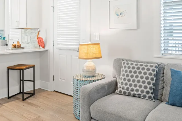 a living room with furniture and window