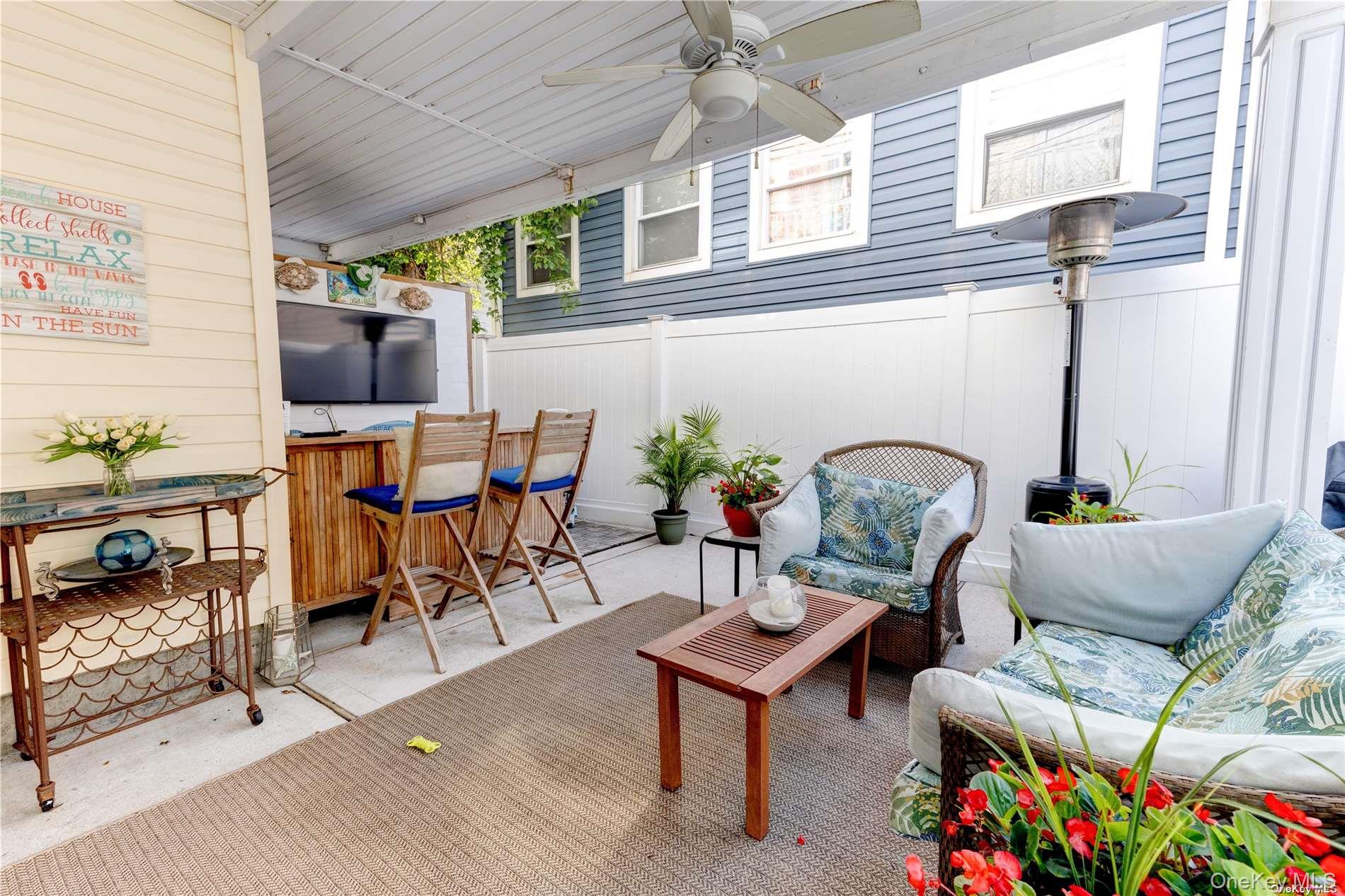 67 Vermont Street Long Beach, NY 11561 - Photo 6 of 26 a outdoor living space with furniture