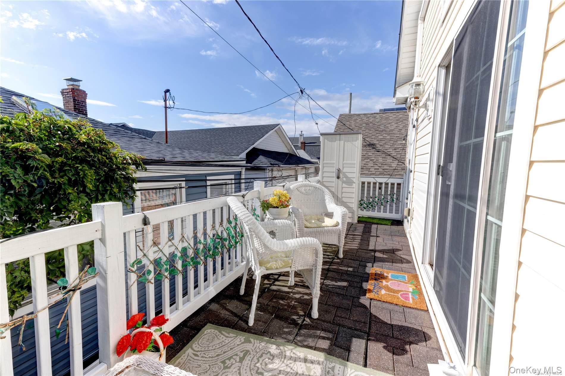 67 Vermont Street Long Beach, NY 11561 - Photo 8 of 26 a view of balcony with furniture
