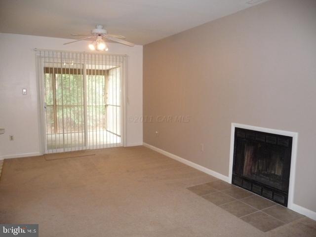30 Beaconhill Road Ocean Pines, MD 21811 - Photo 2 of 12 a view of an empty room with a window