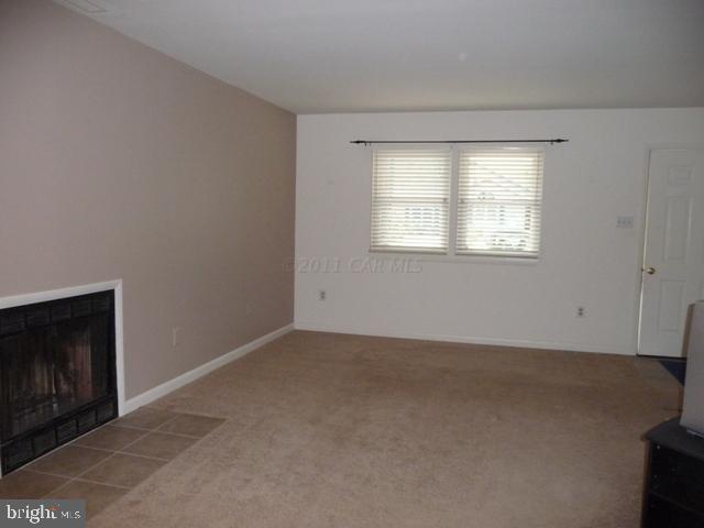30 Beaconhill Road Ocean Pines, MD 21811 - Photo 3 of 12 a view of an empty room with a window
